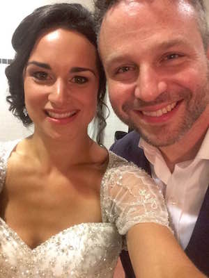 Smiling selfie in the bridal suite after the ceremony